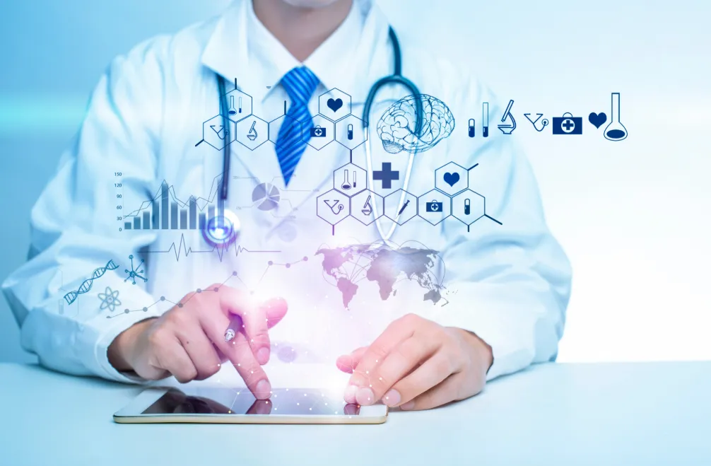 Doctor using a tablet with digital medical icons and data graphics floating above it, representing biomedical informatics and digital healthcare