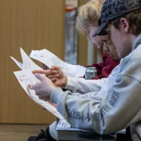 Participants discussing a task at our students' Edinburgh Science Festival 2026 workshop