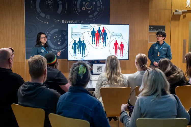 Two of our students presenting at their Edinburgh Science Festival 2026 workshop