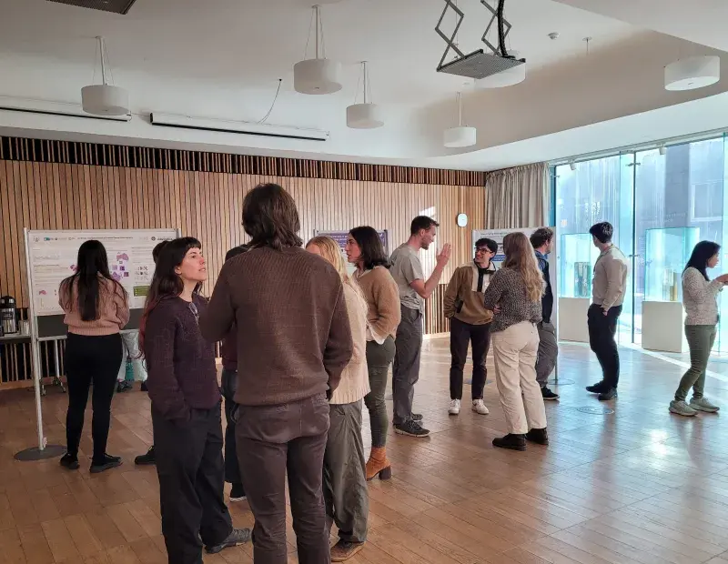 Precision Medicine and AI4BI students during a poster session