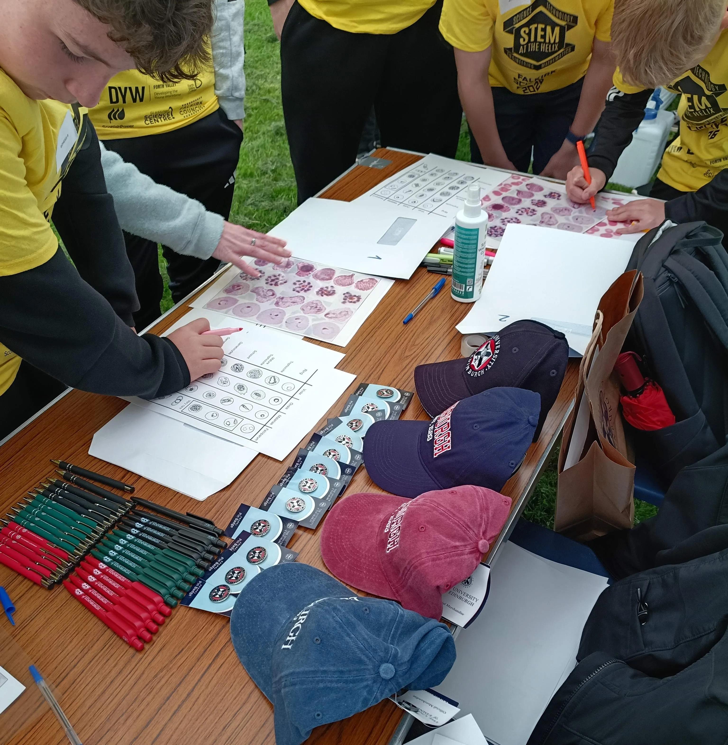 Children gathered around the festival stall