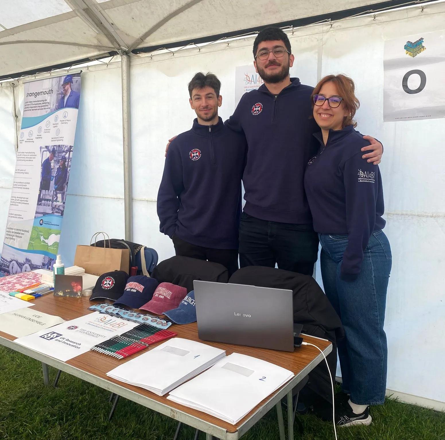 Our students behind their festival stall