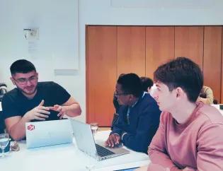 Student group discussion at a workshop