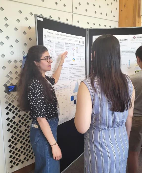 Our student Nikoo presenting her poster
