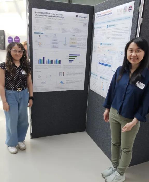 Nardiena and Sim Mei presenting their posters
