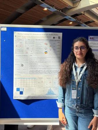 Nikoo presenting her poster